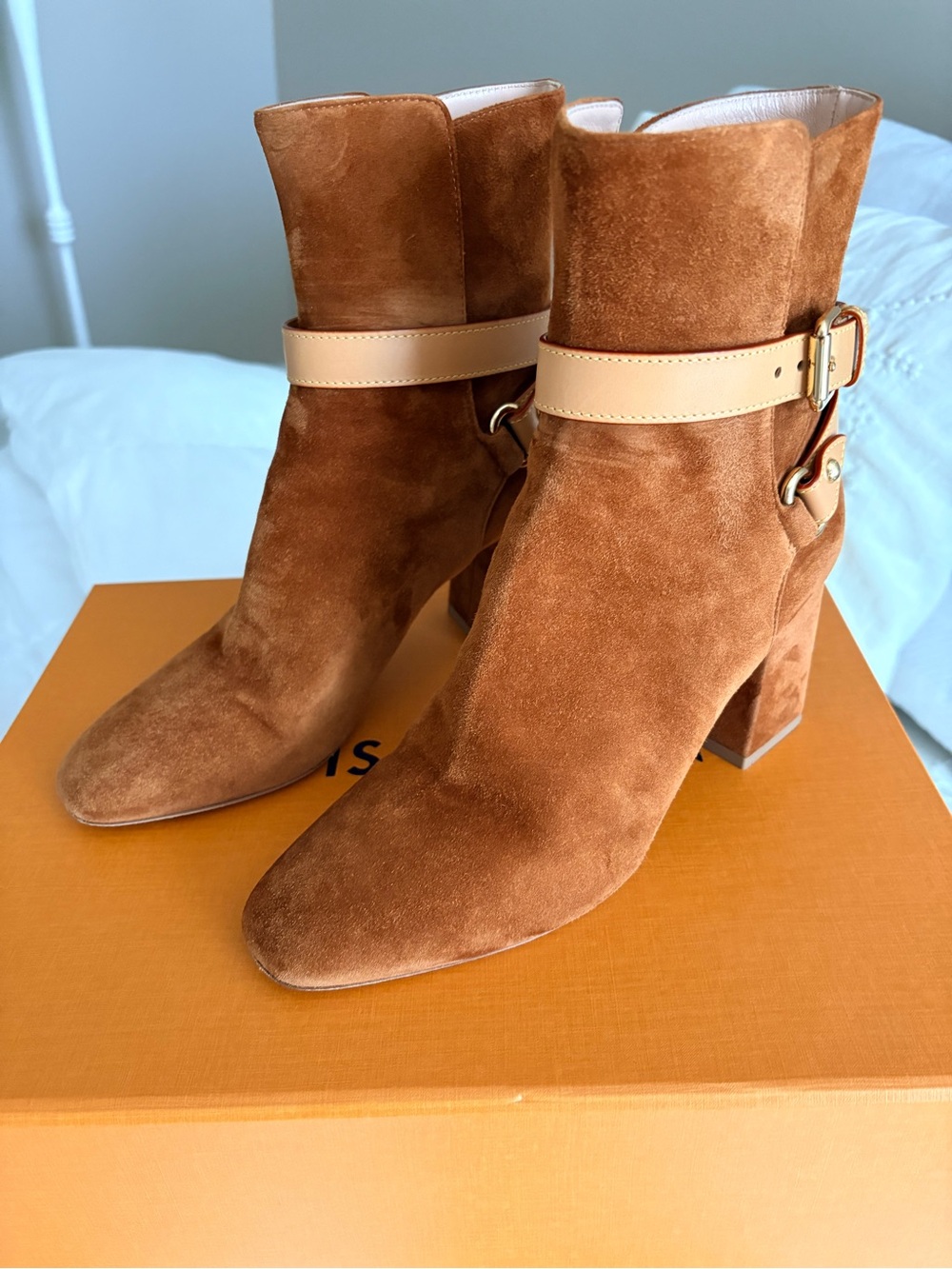 Louis Vuitton Women's Suede Ankle Boots in Chestnut with Leather Strap Detail.